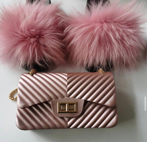 Pink faux fur sliders and handbag